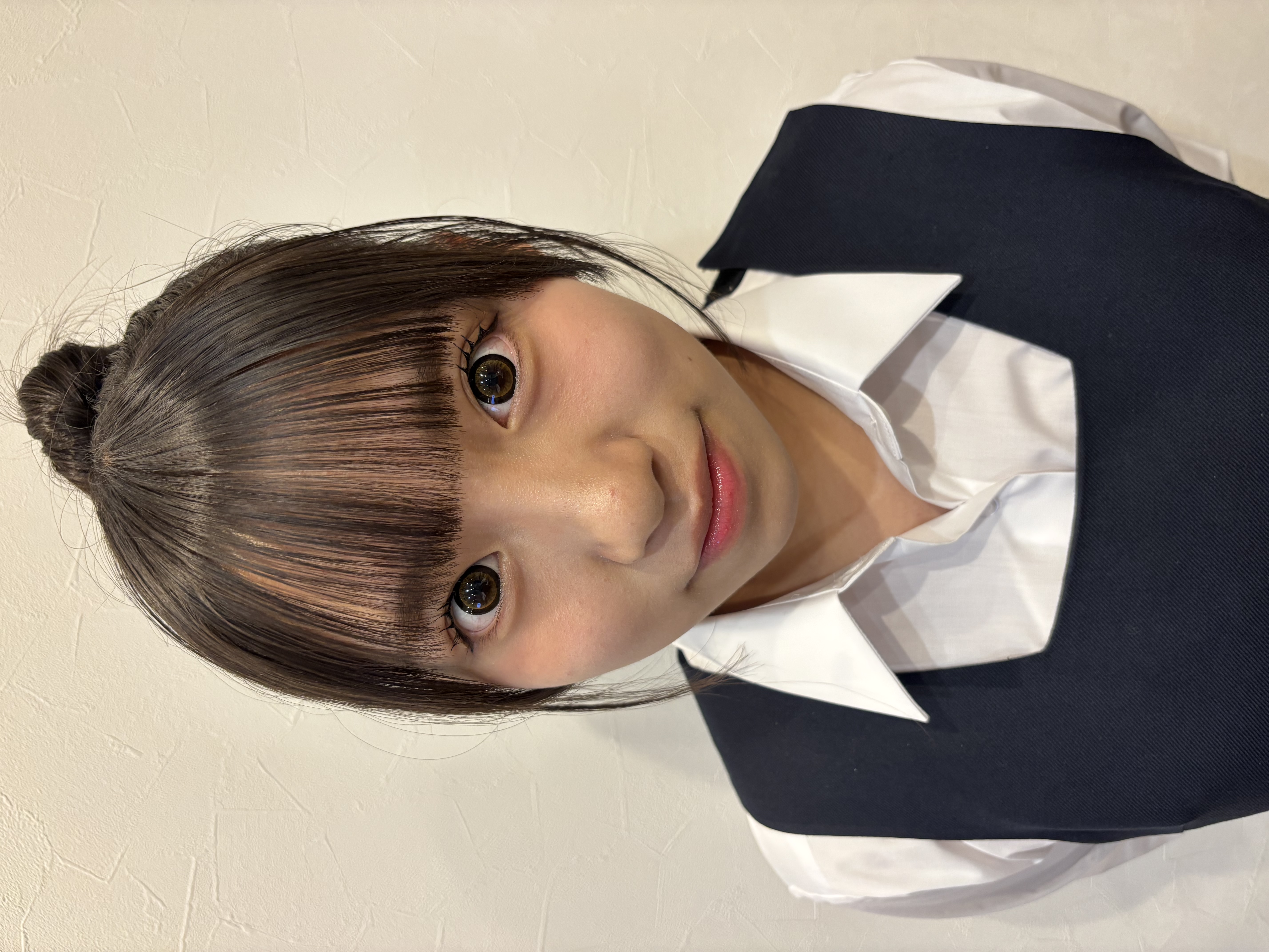 間彦心美